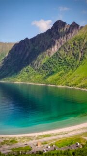 Not the Caribbean. Just Senja in July.
Ersfjordstranda has this trick where the water goes from crystal to emerald to deep fjord blue in about 20 meters. Add the wall of mountains and it feels completely unreal to swim in.

Go early morning for glass water, stay for when the clouds lift off the ridge.

📍 Ersfjordstranda, Senja
🎥 DJI Mavic 4 Pro & Osmo Action 5 Pro

#senja #norway #visitnorway #djimavic4pro